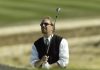 Kevin Costner watches bunker shot Getty Images